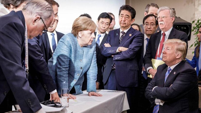 La alemana Angela Merkel discute con Donald Trump durante Cumbre del G7 en Canadá. AP