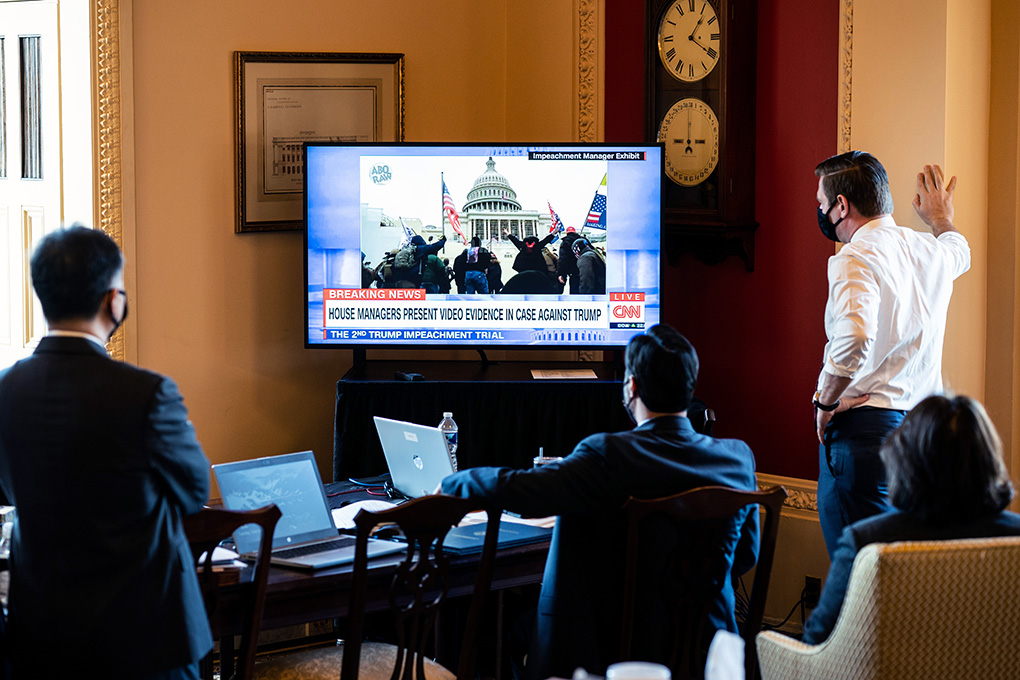 Several of the House impeachment managers watch the prosecution’s display of videos from Jan. 6 during the trial at the Capitol on Tuesday, Feb. 9, 2021. As the U.S. Senate opened an unprecedented second impeachment trial of former President Donald Trump, the powerful video images of last month’s deadly assault on the Capitol made abundantly clear how different this proceeding will be from the first. (Erin Schaff/The New York Times)